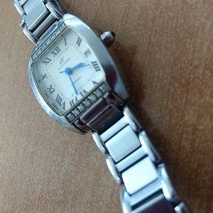 Diamond tank style watch